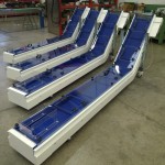 Painted steel version for medical industry, FDA belt by blue polizene and Lexan perspex covers, products inlet and inspection doors 1